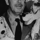 Walt Disney making dogs kiss in 1949